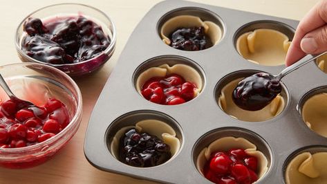 Fourth of July Mini Pie Bites Recipe - Pillsbury.com Mini Pies In Ice Cube Tray, 4th Of July Mini Pies, Pillsbury Mini Pies, Pillsbury Mini Pie Crust Recipes Breakfast, Mini Pie Bites, Pie Cups, Mini Pie Crust, 4th Of July Dessert, Holiday Snack