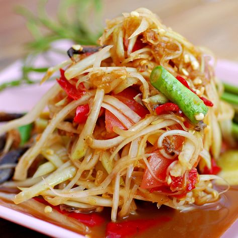 Tum mak hoong is a popular Lao dish that is fast becoming well known around the world for its unique spiciness and flavor. The term “tum” in Laos means to “smash and mix” which is why it is prepared in a Laos Style Mortar and Pestle.        Product Featured in this Recipe            Loas Style Mortar Papaya Salad Laos, Green Papaya Salad, Cambodian Food, Laos Food, Thailand Food, Papaya Salad, Asian Dishes, Food Presentation, Thai Recipes