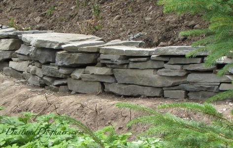 DIY Stacked Stone Retaining Wall – Part 2 – DustandDoghair Rock Wall Diy, Garden Rock Wall, Stacked Stone Retaining Wall, Stone Garden Wall, Homesteading Diy Projects, Dry Stack Stone, Stacked Stone Walls, Sloped Yard, Homesteading Diy