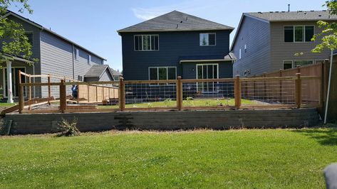 Short Retaining Wall Front Yard, Retaining Wall Fence On Top, Retaining Wall With Fence On Top, Fence On Top Of Wall, Hogwire Fence, Retaining Wall Fence, Contractor License, Backyard Retaining Walls, Split Rail Fence