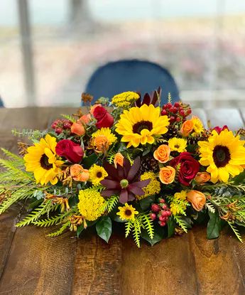 Traditional long and low Thanksgiving Centerpiece with designers choice of best available fall flowers. #TheBlossomShop Long And Low Floral Centerpiece, Thanksgiving Floral Arrangements, Thanksgiving Floral, Thanksgiving Flowers, Fall Flower Arrangements, Fall Floral Arrangements, Thanksgiving Centerpieces, Flowers Online, Fall Centerpiece