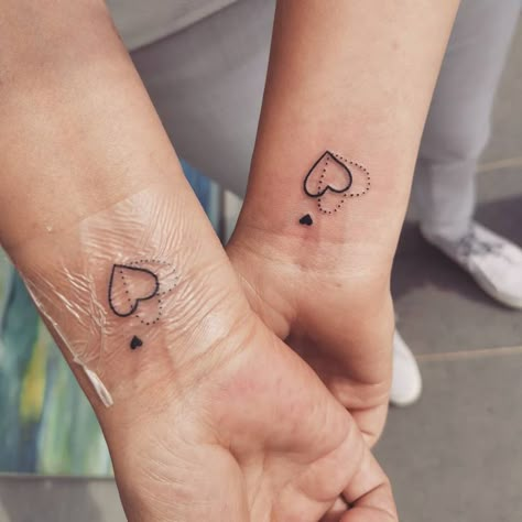 We found the coolest and prettiest matching mother-daughter tattoo ideas for 2020, ahead, including tiny stars, watercolor birds, locks and keys, and more. Matching Tattoos Godmother And Goddaughter, Mother Daughter Tattoos Dainty, Mini Mother Daughter Tattoos, Matching Tattoos With Stepmom, Delicate Mother Daughter Tattoos, Matching Heart Tattoos Mother Daughters, Tiny Matching Tattoos Mother Daughter, Tiny Mother Daughter Tattoos Simple, Mother Daughter Micro Tattoos