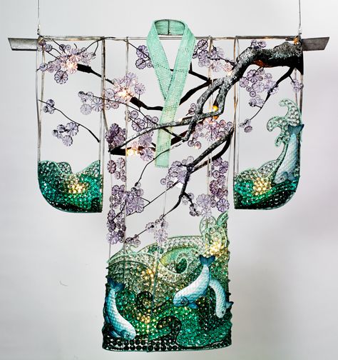 Kimono with Koi  45"wide x 45" high  Shown as a hanging light.  This Kimono is a composite of many elements we love in Kimono and Japanese art:  Koi fish, cherry blossoms and beautiful branches.   Available in many different color combinations and sizes.  Handmade in New York. Embroidery Kimono, Modern Kimono, Kimono Design, Sashiko Embroidery, Colorful Parrots, Canopy Design, Japanese Geisha, Japanese Embroidery, Traditional Fabric