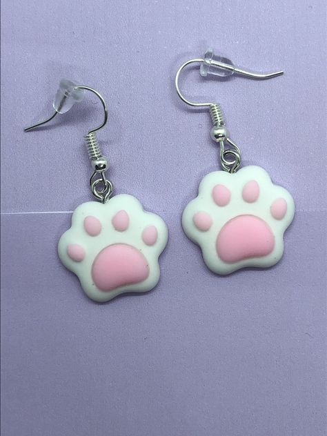 These cute earrings are made from plastic and are attached to a silver plated earring hook. Each earring also has a rubber backing 💖 All earrings come beautifully displayed on a card and are placed into a sealed cellophane bag before they are mailed to you 💌 Aesthetic Clay Earrings, Novelty Earrings, Clay Earrings Ideas, Fimo Earrings, Paw Print Earrings, Clover Earrings, Adult Crafts, Cellophane Bags, Cute Earrings