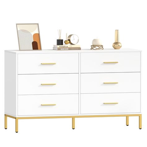 PRICES MAY VARY. Modern Design: If you prefer clean, crisp and modern interiors, now this dresser suits you well. Its designs of white look are easy to match any color tones of you home, making your home more charming and stylish Ample Storage Space: The white dresser comes with 6 large metal-rail drawers can store a wide variety of items such as clothes, books and toys. What’s more, it is easy for you to sort the items with the 3 drawers on each side. The wide desktop allows you to display fram Amazon Dressers, Cute Bedrooms For Teen, Large White Dresser, Dresser For Closet, White And Gold Dresser Bedroom, Gold And White Bedroom Decor, White Dresser With Gold Hardware, Aesthetic Dresser, White And Gold Dressers