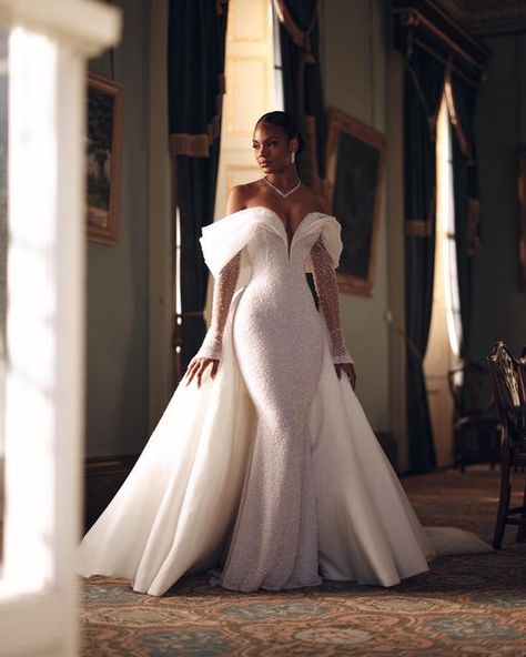 ALONUKO BRIDAL on Instagram: "OPU-08 | The gown is adorned with elegant beading, featuring a plunge neckline and expertly crafted off-shoulder draping. Adding a contemporary touch, the detachable beaded point-edge sleeves provide a modern edge.  #alonukobridesdoitbest" Glam Wedding Dress, Classy Wedding Dress, Afrikaanse Mode, Stylish Wedding Dresses, Fancy Wedding Dresses, White Wedding Dress, Fancy Wedding, Womens Wedding Dresses, Dream Wedding Ideas Dresses