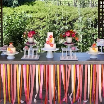 table skirt made of ribbons in place of a table cloth to add a pop of color.  You can use the same idea for your party and even cut down on the cost by using colorful crepe paper streamers to create the same effect. Creative Birthday Party Ideas, Streamer Decorations, Crepe Paper Streamers, Paper Streamers, Party Tips, Wedding Dessert Table, Table Skirt, Diy Ribbon, Cake Table