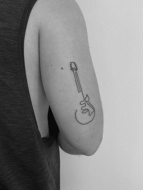 Simplistic Guitar Tattoo, Cool Guitar Tattoo Designs, Guitar Back Tattoo, Minimal Lines Tattoo, Cute Guitar Tattoos, Minimalistic Guitar Tattoo, One Line Guitar Tattoo, Cool Guitar Tattoos, Minimal Tattoo Music