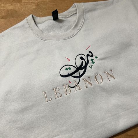 Beruit Lebanon sweatshirt is now available on both Etsy and TikTok shop!! Linked in bio! #lebanon #lebanese #beruit #embroidery #embroideryart #embroidered #janadesigns Beruit Lebanon, Tiktok Shop, Lebanon, Embroidery Art, Embroidery, Sweatshirts, Quick Saves