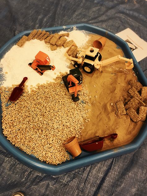 Cocoa powder, custard powder, Cheerios and diggers Digger Tuff Tray, Cheerio Sensory Play, Crushed Cheerios Sensory Bin, Digger Sensory Tray, Monster Truck Tuff Tray, Dinosaur Messy Play Tray, Digger Party, Edible Sand, Tuff Tray Ideas Toddlers