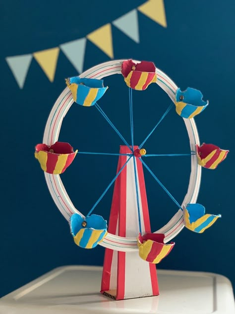 DIY Ferris Wheel Craft • Amusement Park Crafts Diy Ferris Wheel, Wheel Crafts, Plaster Hands, Bus Crafts, Carnival Crafts, Wheel Craft, Wheel Art, Amusement Park Rides, Carnival Rides