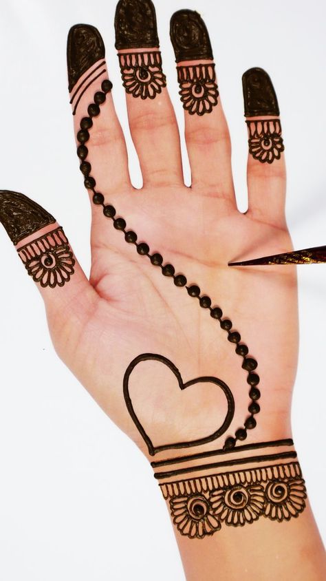 Very beautiful heart shape easy mehndi design for karwachauth. New latest heart mehndi design for front hands. #fronthandmehndi #karwachauth #mehndidesign #mehndi #arabicmehndi #heartmehndi Mehandi Designs For Kids Hands, Mehandi Designs For Hands Easy, Heart Mehndi Designs Simple, Mehndi Designs Simple For Kids, Simple And Easy Mehndi Designs For Front Hand, Easy Mehandi Designs For Hands, Front Hand Mehndi Designs Simple Easy, Very Easy Mehendi Designs, Easy Front Hand Mehndi Designs