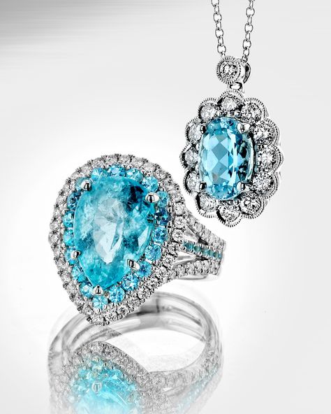 A match made in heaven. This pear shaped Paraiba Tournaline ring surrounded by white diamonds and a split shank design with round Paraibas and a stunning Paraiba pendant with an oval center stone and a scalloped halo of diamonds. What’s your pick? https://simongjewelry.com/collections/specialty-color-gems Simon G Jewelry, Paraiba Tourmaline Ring, A Match Made In Heaven, Paraiba Tourmaline, Match Made In Heaven, Jewelry Boards, Shine Bright Like A Diamond, Colored Gems, Tourmaline Ring