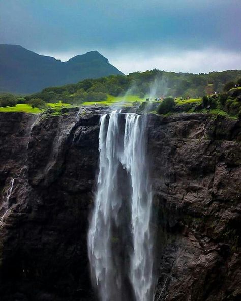 Reverse Water Fall, Sandhan Valley, Konkan, Maharashtra. Naneghat Reverse Waterfall, Sandhan Valley, Konkan Maharashtra, Reverse Waterfall, World Flags With Names, Waterfall Quotes, Travel India Beautiful Places, India Travel Places, Amazing Places On Earth