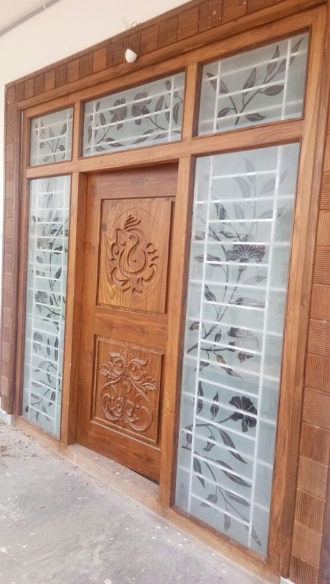 Main Door Glass Design Entrance, Main Door Glass Design, Door Frame Design, Indian Main Door Designs, Teak Wood Bed, Wood Door Design, Door Flower Decoration, Single Main Door Designs, Main Door Lock