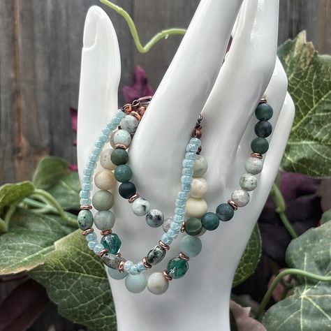 Set of 3 stretch bracelets displaying a mix of coordinated gemstones, Czech glass, and TOHO seed beads. Great to wear on their own or create your own look by stacking with other bracelets for a boho look. Find these beautiful bracelets in my Etsy shop: https://spiritwoodsdesigns.etsy.com/listing/1750785947 #amazonitejewelry #amazonitebracelet #mossagatebracelet #jasperbracelet #stretchbracelet #stretchbracelets #stackingbracelets Moss Agate Bracelet, Amazonite Jewelry, Amazonite Bracelet, Beautiful Bracelets, Jasper Bracelet, Bracelet Display, Boho Look, Bracelet Stack, Wood Design