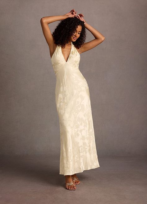 Janae Cream Halter Maxi Dress Atelier Dresses | Azazie Cream Formal Dresses, Romantic White Dress, Cream Bridesmaid Dresses, Atelier Dress, Cream Dresses, Dresses For The Races, Halter Prom Dresses, White Halter Top, Champagne Dress