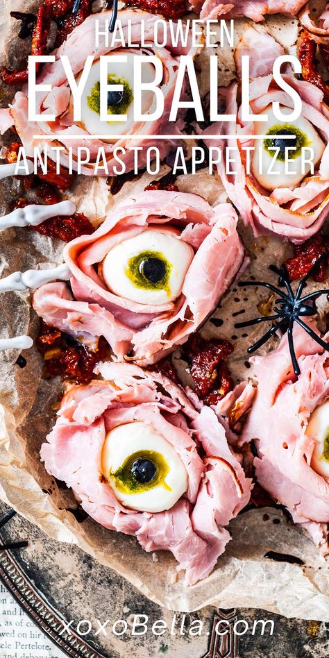 Although there are literally hundreds, if not thousands, of Halloween appetizers to choose from, antipasto eyeballs are one of the most fun. Suitable for any Halloween party, this Halloween charcuterie board addition looks great and combines a variety of wonderful Italian flavours in every mouthful, including mozzarella, ham, fresh basil, sun-dried tomatoes, and more. Mini mozzarella balls pair with basil, ham, and a sweet balsamic glaze to make this extra-special mozzarella eyeballs recipe. Eyeball Charcuterie, Halloween Snack Board For Adults, Halloween Charturie Board, Witch Charcuterie Board, Antipasto Eyeballs, Halloween Kabobs, Halloween Boards Food, Savory Halloween Food For Party, Halloween Party Side Dishes