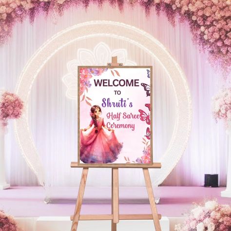 Puberty Ceremony or Half Saree Ceremony Welcome Board, beautiful pink butterfly design. #pubertyceremony #pubertyfunction #puberty_ceremony #halfsareefunction #halfsareeceremony #halfsareewelcomesign #halfsareewelcomeboard #halfsareefunction #halfsareefunctiondecor #halfsareefunctiondecors #puberydecoration Half Saree Ceremony Decoration, Simple Stage Decorations, Half Saree Function, Welcome Boards, Stage Decorations, Half Saree, Pink Butterfly, Butterfly Design, Ceremony Decorations