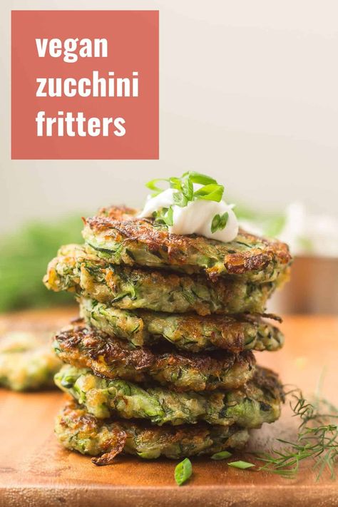 These vegan zucchini fritters are seasoned up with garlic, dill and a hint of cumin, pan-fried to a crisp, and served with a sprinkling of fresh chives. Delicious on their own, but also perfect for dipping! #veganrecipes #zucchini #fritters Fritters Vegan, Vegan Zucchini Fritters, Vegan Cucumber, Zucchini Fritters Recipe, Vegan Sauce, Fritters Recipe, Vegan Zucchini, Zucchini Fritters, Vegan Sauces