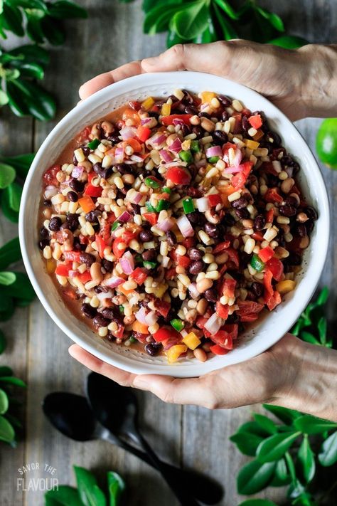 Crowd Pleasing Cowboy Caviar: a healthy recipe that is easy to make ahead for a party. Marinate this simple dip with a homemade vinegar dressing that is best served cold. Black eyed peas, black beans, shoepeg corn, and fresh raw veggies drizzled with lime juice are a winning summer combination for kids and adults. | www.savortheflavour.com #cowboycaviar #texascaviar #foracrowd #salsa #salad Cowboy Caviar No Corn, Cold Apps For A Crowd, Texas Caviar Dip, Shoepeg Corn, Cold Veggie Pizza, Cowboy Salad, Homemade Vinegar, Easy Veggie Side Dish, Strawberry Chicken Salad