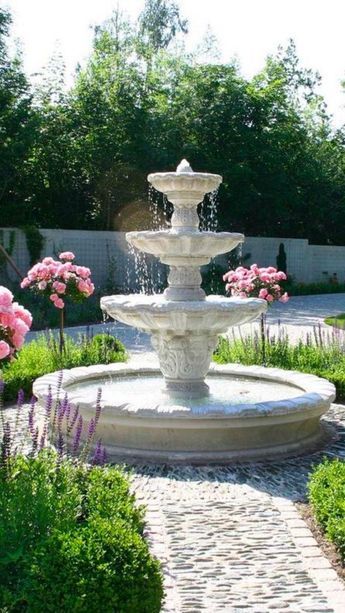 If there’s anything that can turn an otherwise ordinary outdoor living space into a very relaxing and inviting area, it’s a water fountain. This brief guide will serve as a beginner’s introduction to the subject of water fountains and cover type of fountain and their placement. Yard Water Fountains, Spa Outdoor, Garden Water Feature, Outdoor Spa, Water Fountains, Garden Fountains, Cottage Home, Koi Pond, Pool Spa