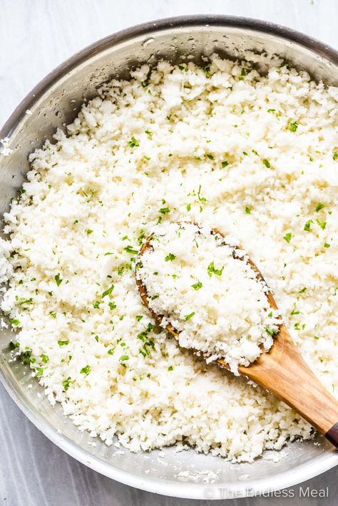 PIN TO SAVE FOR LATER! Learn how to make cauliflower rice in just a few minutes. It's an easy recipe that tastes great with curry, stir-fries, or rice bowls, any saucy main course. #theendlessmeal #cauliflowerrice #cauliflower #rice #cauliflowerrecipes #ricerecipes #healthyrecipes #lowcarb #lowcarbrecipes #keto #ketorecipes #sidedish #paleo #whole30 #vegan #veganrecipes Quinoa Cooking, Making Cauliflower Rice, Make Cauliflower Rice, How To Make Cauliflower, Raw Cauliflower, Frozen Cauliflower Rice, Cauliflower Rice Recipes, Clean And Delicious, Low Carb Sides