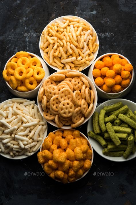 Group of Crunchy Snacks by stockimagefactory. Group of Corn Puff, cheese balls and rings, crispy salty Wheel fryums, puffed rice and potato #Sponsored #Puff, #Corn, #balls, #cheese Indian Snacks Photography, Chips Chaat, Snacks Photography, Puff Snacks, Corn Balls, Puff Corn, Crunchy Snacks, Corn Puffs, Eating Food Funny