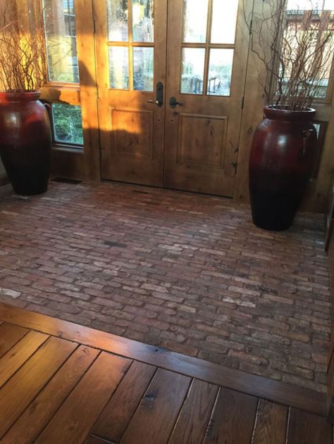 Brick To Hardwood Transition, Old Brick Flooring, Brick Flooring Transition To Wood, Stone Brick Wood Interior, Polished Brick Floor, Brick Floor Transition To Wood Floor, Brick Entryway Floor Front Entry, Brick Hallway Floor, Rustic Brick Floor