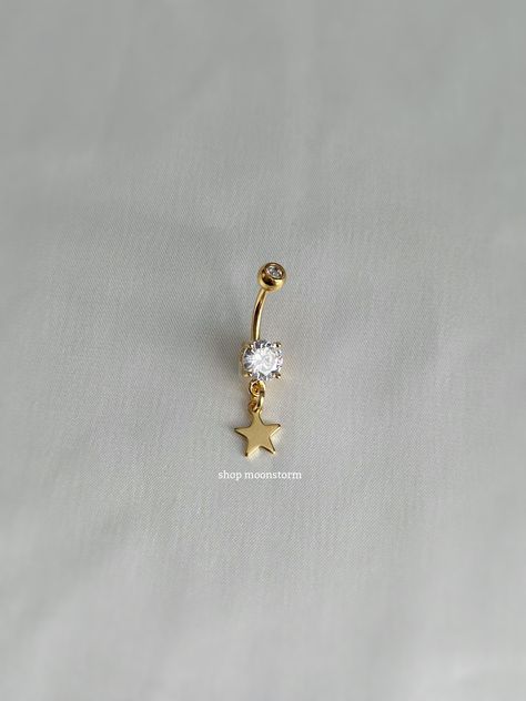 - 14g - 10mm bar - Water resistant - Surgical steel bar - Stainless steel star charm - Will not rust or tarnish Saturn Belly Button Ring, Belly Button Piercing Basic, Gold Navel Jewelry, Belly Button Jewelry Dangle, Long Belly Button Piercing, Star Belly Button Piercing, Y2k Belly Button Piercing, Summer Belly Button Rings, Belly Button Piercing Gold