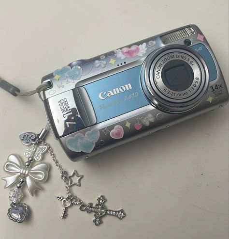 canon a470 #deco #digitalcamera #camera #cute Digital Camera Charm Strap, Digital Camera Deco, Blue Digital Camera, Blue Camera Aesthetic, Decorated Camera, Amazon Camera, Y2k Digital Camera, Digi Camera, Blue Camera