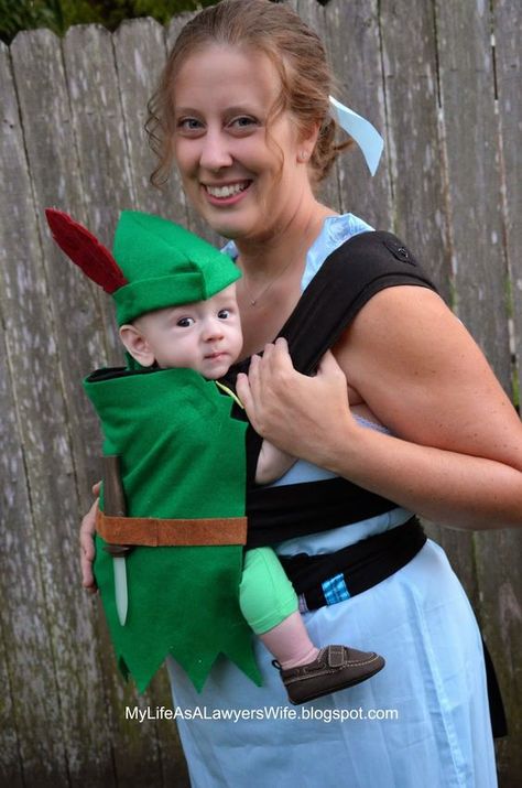 Peter Pan and Wendy Babywearing Halloween Costumes.  woodstock halloween costume, malificent costume halloween, geisha costume halloween #halloweencostumeidea #halloweencostumesforsale #HalloweenCostumesByMe Baby Wearing Halloween Costumes, Baby Carrier Halloween Costumes, Baby Peter Pan Costume, Baby Wearing Costumes, Disfraz Peter Pan, Halloween Costumes Girl, Baby Carrier Costume, Mom Halloween Costumes, Peter Pan Costumes