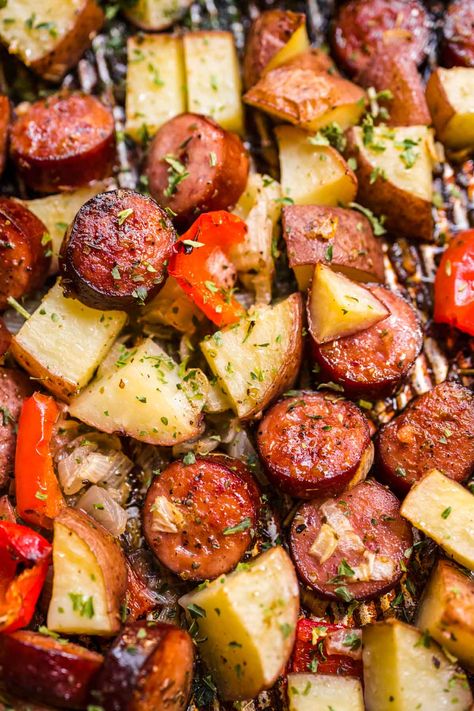 Sheet Pan Sausage and Vegetables is an easy weeknight dinner that you can prep in a few minutes with bell peppers, red potato, and zucchini. Sausage Potatoes And Peppers, Kilbasa Sausage Recipes, Smoked Sausage And Potato Recipe, Potato And Zucchini, Sausage And Vegetables, Sheet Pan Sausage, Kielbasa And Potatoes, Pan Sausage, Sausage Peppers And Onions