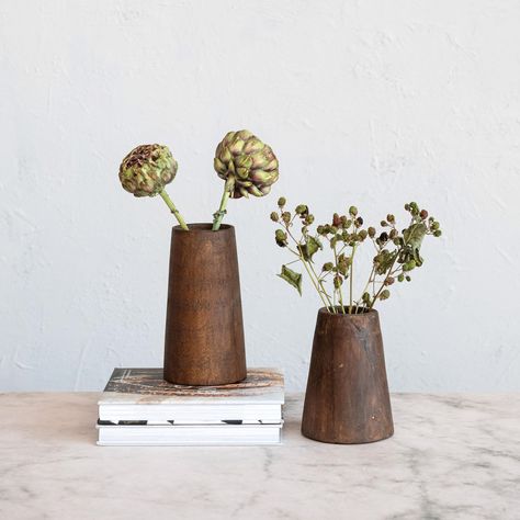 PRICES MAY VARY. A pair of rustic and charming wood vases that are made from found reclaimed wood and have a distressed finish that gives them a vintage and unique look This set of vases is ideal for farmhouse, French country, boho, global, or modern style, and can add some texture and character to any space These vases can be used as decorative accents on their own or to hold dried or artificial flowers, plants, or branches Made of found reclaimed wood that is durable and easy to clean The larg Wood Vases, Wood Vase, Holding Flowers, Creative Co Op, Salvaged Wood, Antique Farmhouse, Joanna Gaines, Vase Set, Flowers Plants