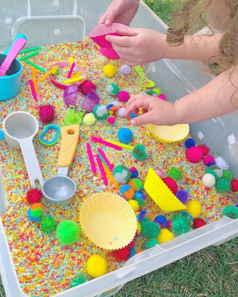 Cupcake Sensory Bin 🌈🎉 I finally took the time to dye rainbow rice for sensory play, and it was so worth it! (If you haven’t dyed your own… Cake Sensory Bin, Alice In Wonderland Sensory Bin, Cupcake Sensory Bin, Rice Sensory Bin Ideas, Birthday Sensory Bin, Sheep In A Jeep, Rainbow Rice Sensory Bin, Coloured Rice, Sensory Rice