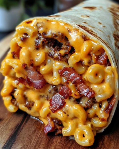 Satisfy your cravings with a Bacon Macaroni Cheeseburger Wrap! This delicious creation combines savory ground beef, perfectly cooked macaroni, crispy bacon, and gooey cheddar cheese, all wrapped up in a soft flour tortilla. A touch of ketchup and mustard adds the classic cheeseburger flavor. Easy to make and utterly satisfying, it's a fun twist on two comfort food favorites. Mac And Cheese Burrito, Cheeseburger Wrap, Ultimate Mac And Cheese, Cheese Burrito, Cottage Cheese Breakfast, Ketchup And Mustard, Salad Inspiration, Bacon Mac And Cheese, Lactation Recipes