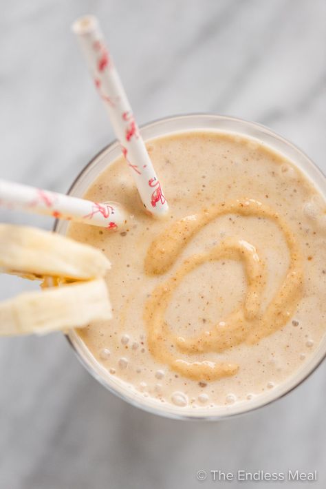 PIN TO SAVE! This peanut butter banana smoothie is quick and easy to make, healthy, and super delicious. It tastes like a peanut butter milkshake but is made with only healthy ingredients and is perfect for breakfast on the go! #theendlessmeal #smoothie #bananasmoothie #peanutbuttersmoothie #peanutbutter #bananan #peanutbutterbananasmoothie #smoothierecipe #breakfast #breakfastsmootie #healthy #vegan #vegetarian #plantbased #morning #paleo #breakfastrecipes Smoothie Recipes Protein, Breastfeeding Cookies, Peanut Butter Milkshake, Green Breakfast Smoothie, Easy Healthy Smoothie Recipes, Almond Butter Smoothie, Recipes Protein, Peanut Butter Banana Smoothie, Delicious Paleo Recipes