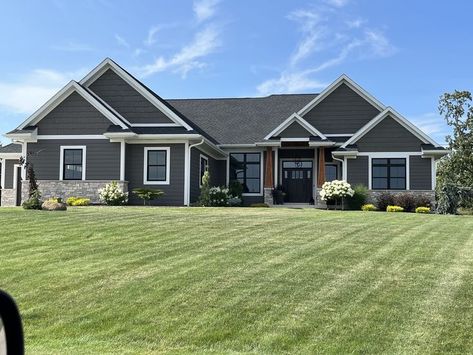 New Home Exterior Colors, Dark Gray And White House Exterior, Dark Gray House With White Trim, Black Siding With White Trim, Gray Exterior Black Windows, Dark House With White Windows, Dark Gray Barndominium Exterior, Dark Gray Ranch House Exterior, Grey Ranch House Exterior