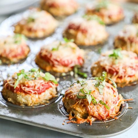 Mozzarella-Stuffed Chicken Parmesan Meatloaf Muffins combine family-friendly meatloaf with the flavors of chicken Parmesan for cheesy meatloaf muffins that everyone will love! These easy chicken meatloaf muffins use lean ground chicken for a healthier meatloaf option. Mozzarella balls stuffed in the middle amp up the cheesy factor while Parm and marinara make this chicken meatloaf over-the-top delicious! Mini Chicken Meatloaf, Chicken Parm Meatloaf, Buffalo Chicken Meatloaf Muffins, Chicken Parm Mini Meatloaf, Chicken Parm Meatballs Healthy, Chicken Parmesan Meatloaf, Ground Chicken Meatloaf, Parmesan Meatloaf, Cheesy Meatloaf