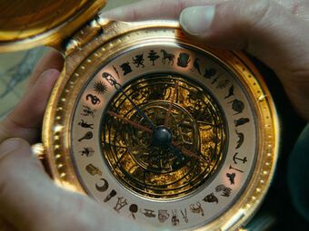 Alethiometer | His Dark Materials | Fandom Lyra Belacqua, The Book Of Dust, Steampunk Movies, Golden Compass, Dark Materials, Philip Pullman, The Golden Compass, Pointing Hand, His Dark Materials