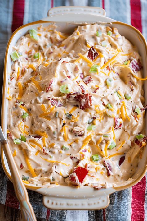 Crock Pot Cowboy Crack Dip is the ideal choice for any gathering. With just a handful of ingredients, you can whip up this tasty dip effortlessly. Cheesy Baked Cowboy Dip offers a delightful blend of warm, melty cheese and the creamy texture of cream cheese, enhanced by the smoky tones of bacon and a hint Cream Cheese Hot Dip, Baked Cowboy Dip, Cowboy Dip, Baked Yellow Squash, Pimento Cheese Dip, Cowboy Candy, Cream Cheese Spread, Vegetable Sticks, Hot Sausage