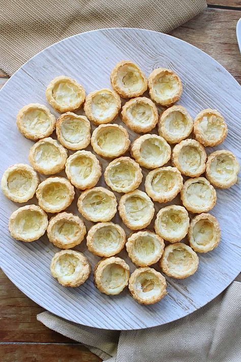 Ever wonder how to make your own fillable Puff Pastry Appetizer Cups? Wonder no more! Once made, you can fill them however you like! They're so versatile! #appetizercups #puffpastryappetizers #appetizers #savoryappetizerpuffs #appetizerpuffpastry #appetizerpuffsforfilling #appetizerpuffs #storeboughtpuffpastry #puffpastryrecipes #puffpastry #kudoskitchenrecipes Puff Pastry Cups Appetizers, Mini Puff Pastry Appetizers, Stuffing Cups, Ham And Cheese Puff Pastry, Ham Cheese Puff Pastry, Breakfast Cups Recipe, Puff Pastry Recipes Savory, Appetizer Cups, Puff Pastry Shells