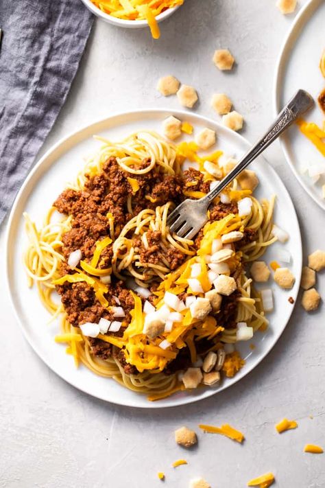 Cincinnati Chili is a classic Midwestern recipe! This chili is nothing like you have ever had before! Slow simmered meat sauce is served over spaghetti noodles.