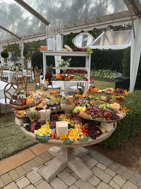 Charcuterie On Round Table, Appetizer Display Wedding, Charcuterie Cups Table Display, Round Table Food Display, Tiered Grazing Table Ideas, Charcuterie Display Presentation, Layered Charcuterie Table, Charcuterie Tiered Tray, Round Table Charcuterie Display