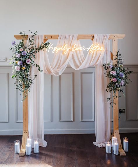 Obsessed. 😍 My current wedding obsession is this dreamy ceremony arch, draped in cascading chiffon and dressed with seasonal spring blooms. Large scale pieces like this are 👌 perfect 👌 for your wedding ceremony, they create a focal point in your space and frame you and your partner as you exchange vows. Later, they can repurposed as a photo backdrop (the neons are great for this) or positioned behind your top table during your reception. Endless possibilities! @lauramayphotographyuk ... Wood Wedding Arch With Draping, Behind Top Table Decor Wedding, Wedding Focal Point, Wedding Arch With Drapes, Wedding Altar Ideas Indoor, Drape Wedding Arch, Wedding Arches Diy, Simple Wedding Reception Table Decor, Back Drops For Weddings Receptions