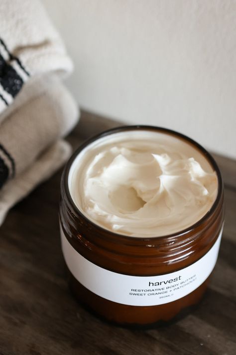 Introducing our luxurious Restorative Body Butter, crafted with a blend of essential oils creating a sensory experience like no other. The refreshing and citrusy notes of sweet orange uplift and invigorate your spirit, while the floral and calming aroma of geranium and lavender soothe and relax your senses. The earthy and grounding scent of patchouli adds a touch of warmth and luxury to the overall fragrance blend. Directions - Massage into cleansed skin using slow circular movements. If irritat Natural Body Moisturizer, Body Butter Product Photography, Body Butter Photography Ideas, Body Butter Photography, Body Butter Aesthetic, Body Care Brands, Butter Photography, Luxury Product Photography, Fresh Cheese Recipe