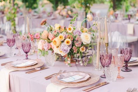 Read More: https://www.stylemepretty.com/2020/11/11/this-is-the-perfect-blueprint-for-how-to-do-a-pastel-wedding-color-scheme-oh-so-right/ Pastel Table Decor, Spooky Spring, Hyde House, 21 Dinner, Colored Taper Candles, Pastel Wedding Colors, Pastel Wedding Theme, Cottagecore Wedding, Luxury Picnic