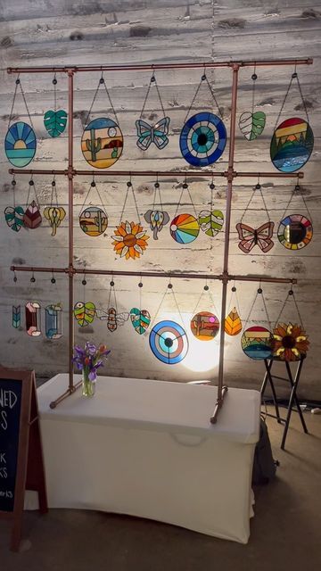 Craft Show Suncatcher Display, Stained Glass Craft Show Display, Stained Glass Craft Booth, How To Display Stained Glass Art, Suncatcher Display Stand, Stained Glass Vendor Display, Stained Glass Display Stands, Stained Glass Booth Display, Stained Glass Market Display