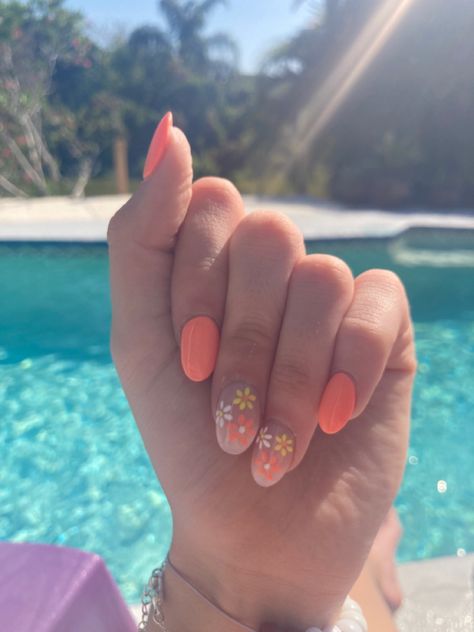 Peach Nails With Flower Designs, Summer Gel Nails Ideas Flowers, Coral Flower Nail Designs, Short Almond Acrylic Nails Flower, Prom Nails Floral, Orange Nails With Daisies, Orange And Flower Nails, Orange Nail Designs Short Nails, Pastel Orange Nails Design