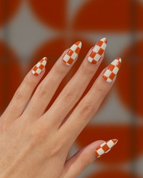 Burnt Sienna Checkers – Warm Orange and White Checkered Nail Bold sienna orange meets clean white lines in this classic checker pattern inspired by the color stories of mid century modern decor. Choose your preferred nail shape and length! Designed by Keara. Burnt sienna checkers Checkered nails Nail length Nail shape Flag nails Hair and nails Nails Chex Nail Art, Orange And White Checkerboard Nails, Wavy Checkered Nails, Orange Checkered Nails, Checkered Flag Nails, Orange Plaid Nails, Fall Almond Shaped Nails, 50s Nails, Fall Stiletto Nails Design